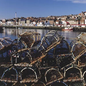Great Britain, England, Yorkshire, Whitby, lobster pots on the quayside of the fishing port