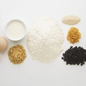 Ingredients for fruity bread; butter, whole egg, brown sugar, milk, white flour, yeast, mixed peel