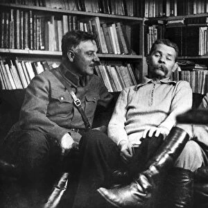 joseph stalin and kliment voroshilov visiting writer maxim gorky (center), 1931