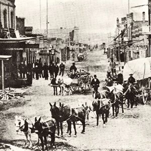 The main street of Helena, 1869, a typical town in the American West with a freight