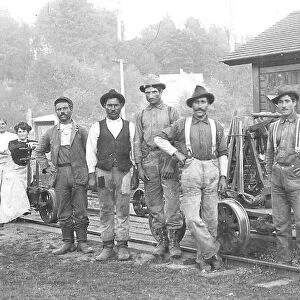This photo depicts a Northern Pacific Railway (USA) section crew. The unidentified crew members