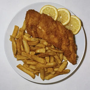 Plate of fish and chips, close up