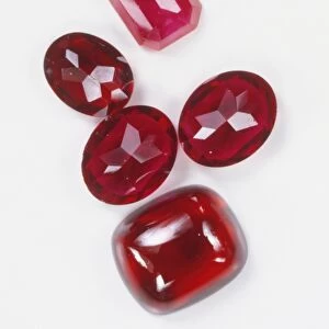Five polished ruby gemstones