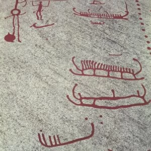 Rock carvings of Tanum or Tanumshede, detail of rock paintings depicting boats with people aboard