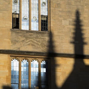 Shadows of Gothic spires on the walls of the Bodleian Library, Oxford - winter morning