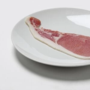 Slice of bacon on plate