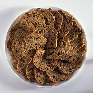 Slices of pumpkin bread on a plate, close-up, view from above