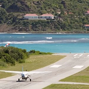 St Barthelemy, plane on runway by the sea