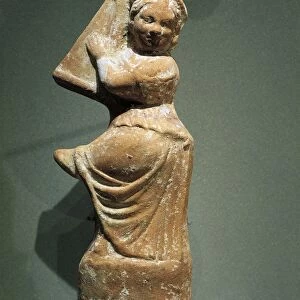 Terracotta figurine depicting a cither player from Kharayeb