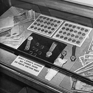 Trial of u2 spy plane pilot francis gary powers, moscow, ussr, 1960, exhibition of wreckage of downed american spy plane, case containing money, watches, rings with which powers was to bribe soviet people