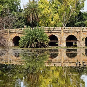Athpula Eight Piers Stone Bridge, 17th Century Bridge, Reflection of Lodi Gardens, New Delhi, India