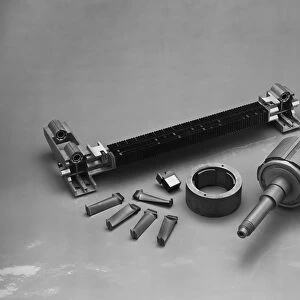 Car parts on grey background, close-up