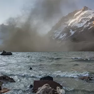 Dust storm on the lake Torre at mount Cerro Torre