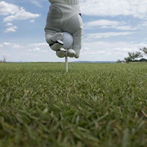 A golf ball is placed on a tee, Germany
