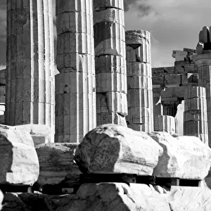 Mono piles of stones before ruined Parthenon