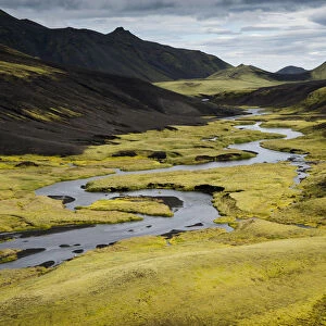 Stream with moss-covered mountains, landscape near Maelifell, Highland, Iceland, Europe