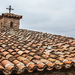 Tiles and cross on roof of Monastery Varlaam