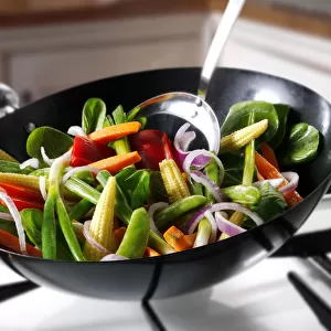 Vegetable stir-fry in a wok