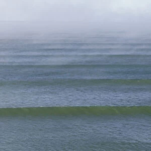 waves on green sea, morning fog, New Zealand