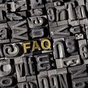 The word FAQ, made of old lead type