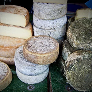 Italian cheeses on market stall in Edenbridge Kent credit: Marie-Louise Avery /