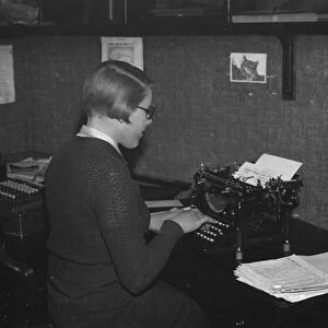 Miss Fowden, typist, at work. 1935