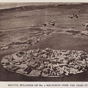 British Bristol Bulldog fighter aircraft of the RAFs No 3 Squadron flying over the city of Suakin, Sudan (b / w photo)