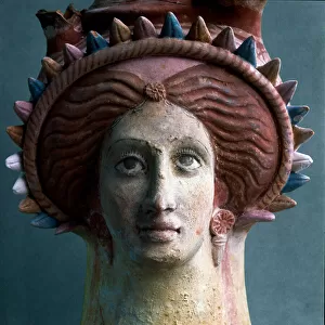 Greek art: detail of a polychrome vase decorating a woman
