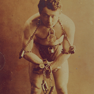 Harry Houdini in chains, c. 1899 (b / w photo)