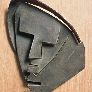 Mask of outline of Little Montserrat (bronze)