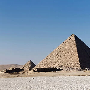 The pyramid of Menkaure next one of the three queen's pyramids, Giza, Egypt, 2020 (photo)