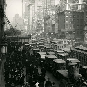 Times Square, crowded with cars, buses and people, c. 1917 (b / w photo)