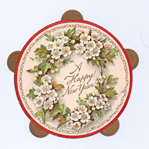 A Victorian die-cut shape New Year card of a tambourine with images of flowers on it, c