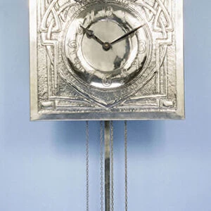 A wall clock by Margaret Gilmour (1860-1942), decorated in repousse with Celtic entrelac
