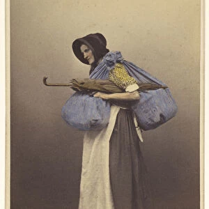 elderly woman wearing bonnet native costume standing
