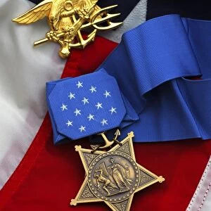 Close-up of the Medal of Honor award and American flag