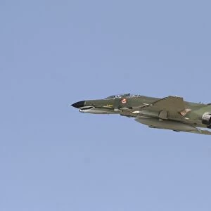 An F-4 Phantom in flight over Houston, Texas
