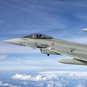 Italian Air Force F-2000 Typhoon aircraft fly in formation