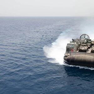 A landing craft air cushion transits the Gulf of Aden