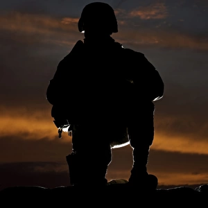 Silhouette of a U. S. Marine in uniform