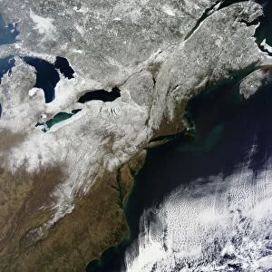 Snow cover stretching from Canada southward to West Virginia