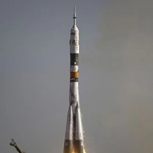 The Soyuz TMA-9 spacecraft launches from the Baikonur Cosmodrome