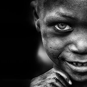 Kid's smile, miner's hands - Benin