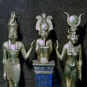 Egyptian gold statuettes of Osiris, Horus, and Isis