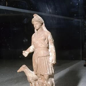 Greek Terracotta, Artemis Bendis with a small hunting dog, c350BC-c300 BC