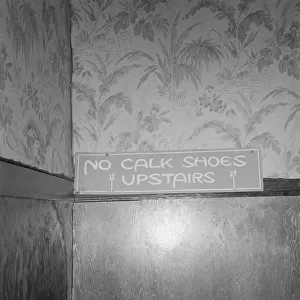 Sign on staircase on Brooks Hotel in a town... West Carlton, Yamhill County, Oregon, 1939. Creator: Dorothea Lange