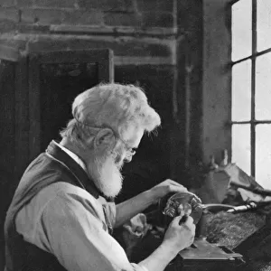 A watch cap maker at work, 1911-1912. Artist: AL Hitchin