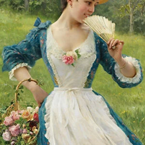 Young beauty with a basket of roses