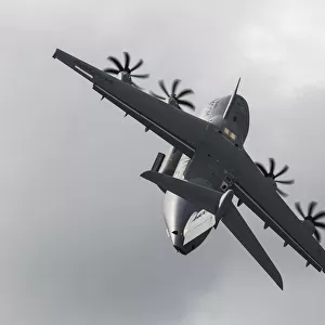 An RAF Atlas (A400M) Climbs toward the clouds