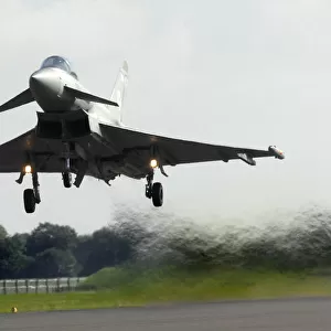 A Typhoon is shown taking off to take part in an Air Display at RAF Coningsby